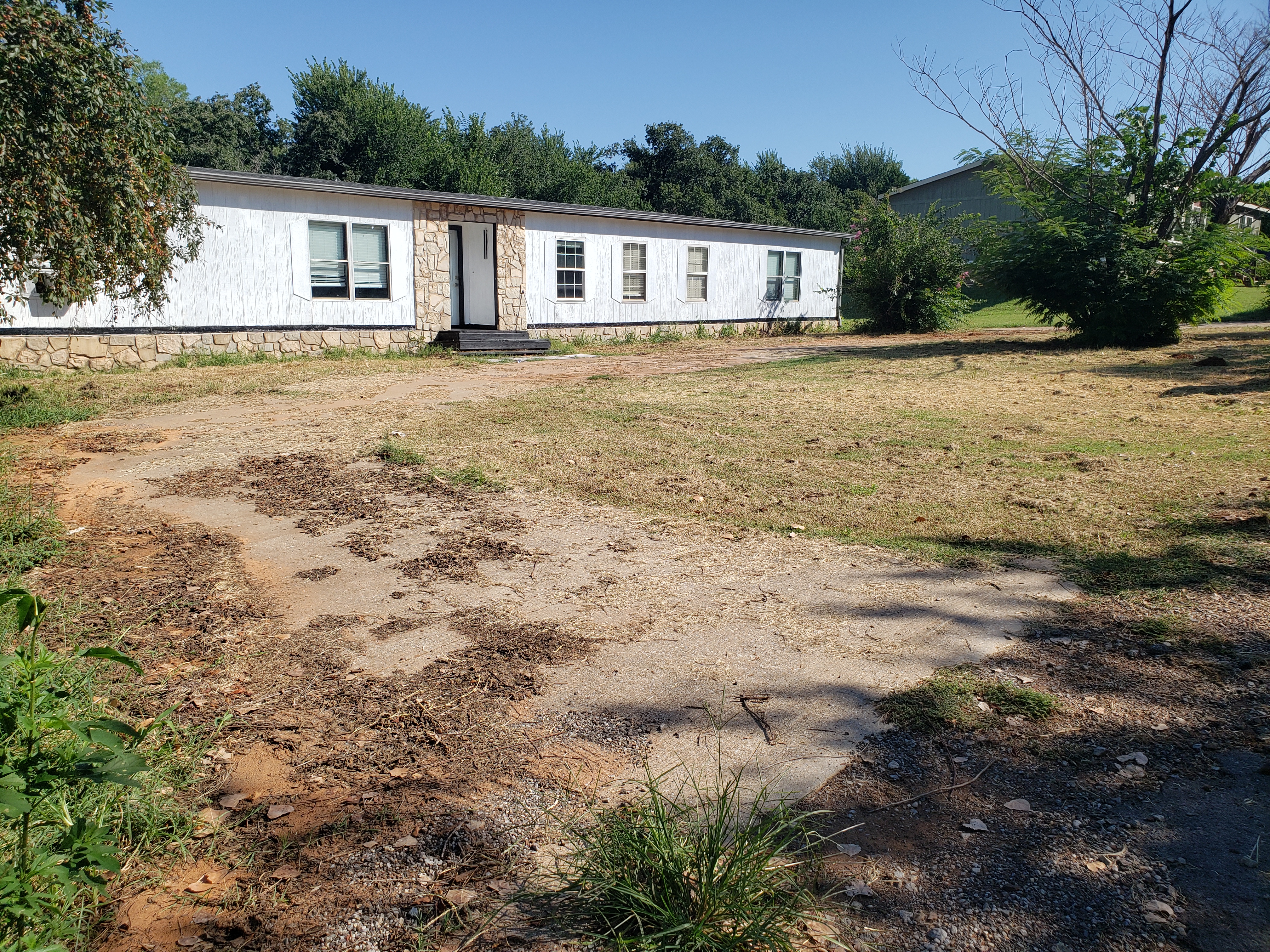 Driveway cleaning for an investor in Edmond, Ok