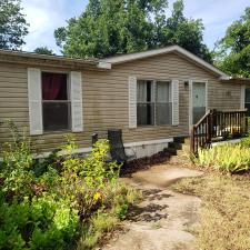 Soft-wash-a-vinyl-siding-home-and-front-porch-cleaning-in-edmond-ok 0